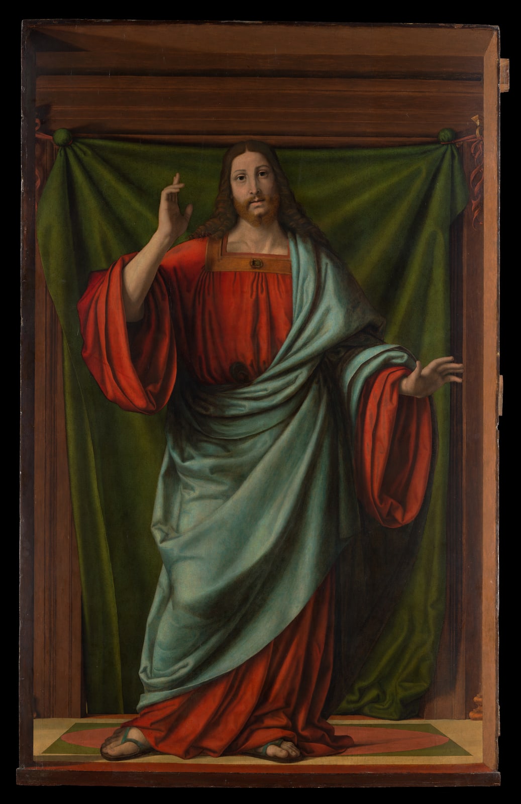 Renaissance painting of Christ raising one hand before a green drape