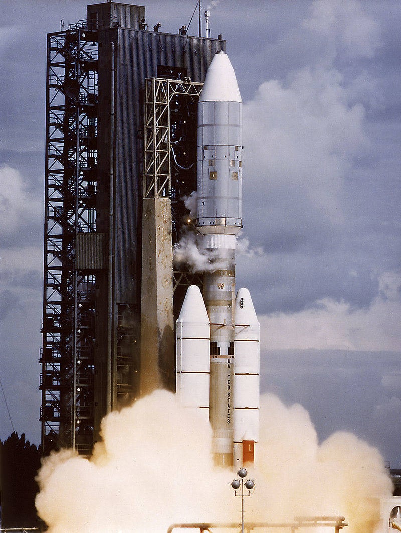Titan III-Centaur rocket launching Voyager 2 amid exhaust clouds
